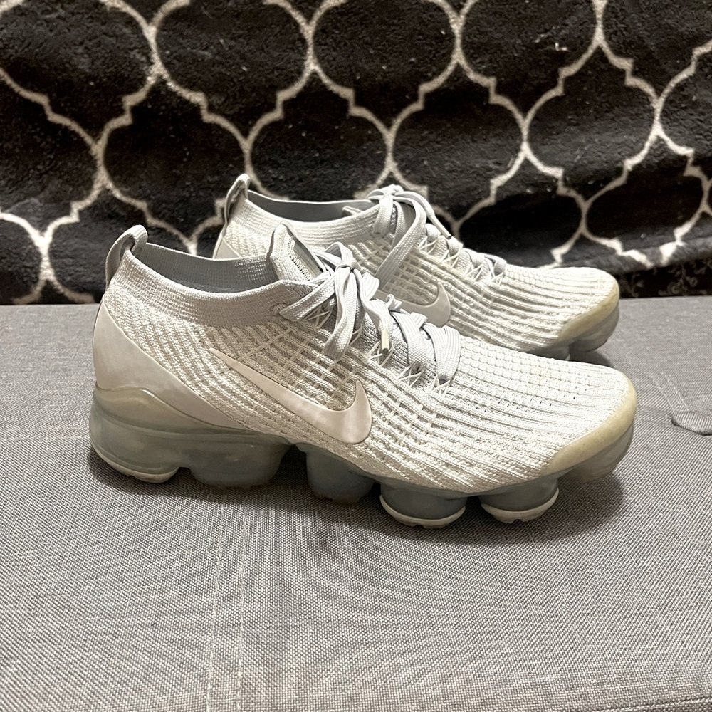 Nike Flyknit Air VaporMax in Pure Platinum. They are size 7.5 in Women’s.